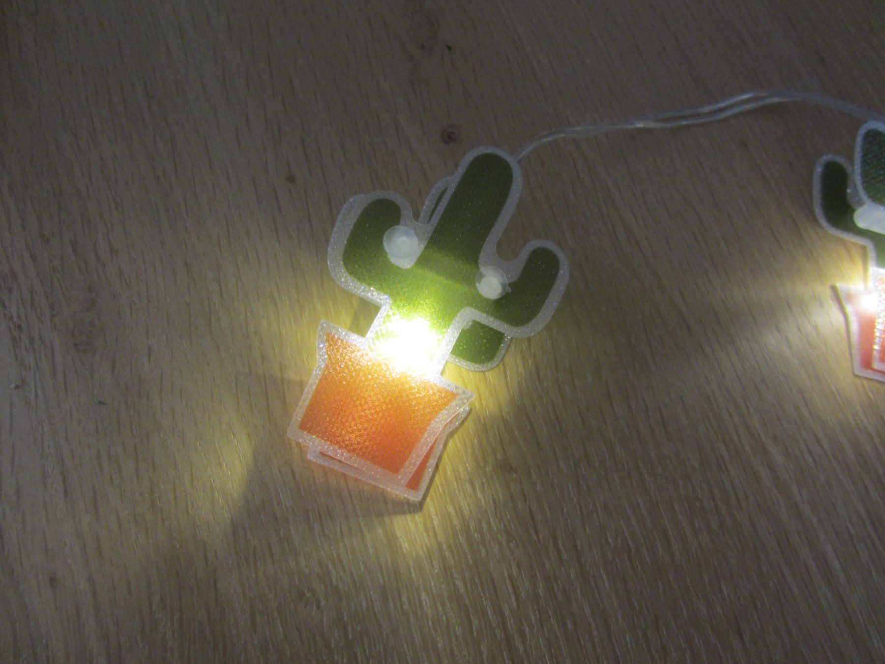 Ghirlande e barre luminose: Lichterkette Kaktus mit 10 Lämpli, ca. 1 Meter – Nuovo e nell'imballaggio originale da Egliswil venduto da chroetli22 2