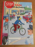 Globi hilft der Polizei 3. Aufl. 1995, 1 Seite leicht bemalt