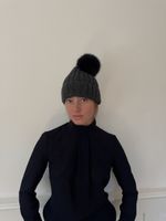Wool hat with a pom-pom