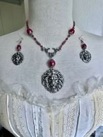 Parure ceramica e leone