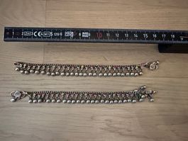2 bracelets with tiny bells