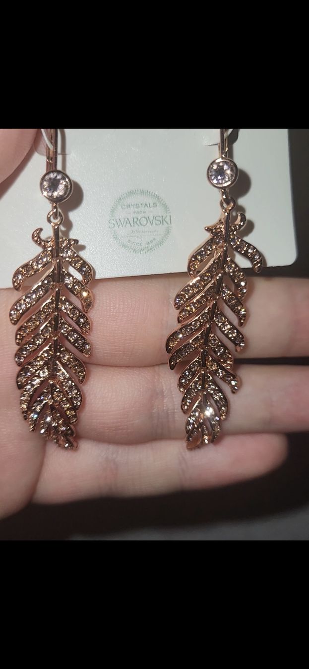 Orecchini pendenti & Orecchini a lobo: Adore Swarovski Rose gold plated feather dangle earrings – Nuovo e nell'imballaggio originale da Buchs SG venduto da cap_qnl6 1