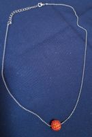 Collier avec pendentif boule strassée orange
