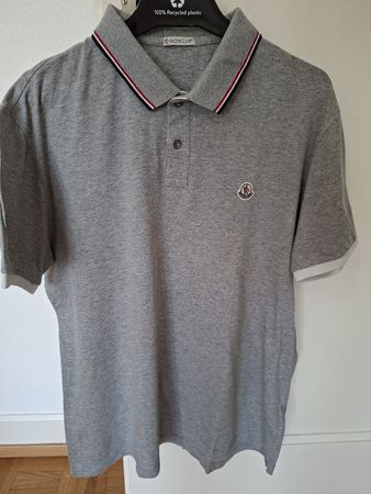 Polo Moncler gris  manches courtes bon état