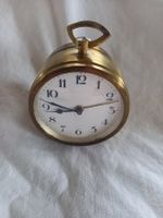 Réveil ancien mécanique en laiton doré
