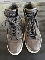 Une paire de Sneakers HOGAN REBEL en brun cuivré