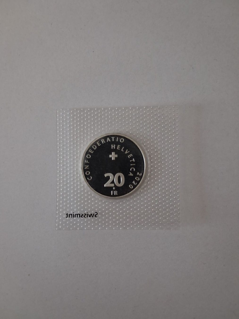 Tutti le monete: Roger Federer, pièce commémorative suisse de 20 francs – Nuovo e nell'imballaggio originale da Dombresson venduto da Saluro 1