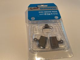 Plaquettes de frein disque Shimano K03Ti résine 1 jeu neuf