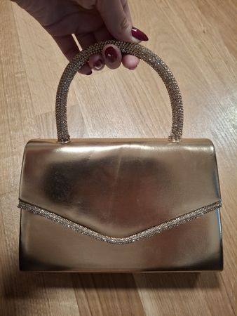 Elegante goldene Handtasche mit Strass