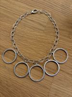 Collier argent 925 avec cinq anneaux état neuf