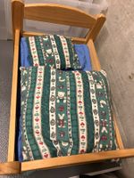 Letto di legno per bambole