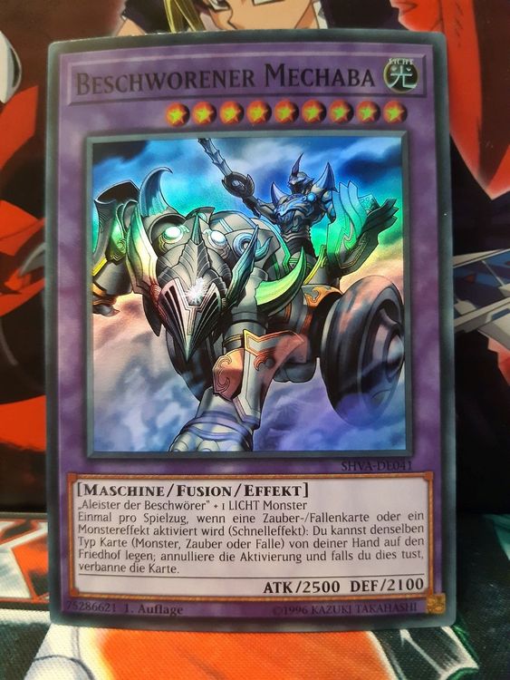 SHVA-DE041 Beschworener Mechaba – Super Rare – 1. Auflage – Deutsch – Shadows In Valhalla – Inkl. LMS Trading Fieldcenter-Karte