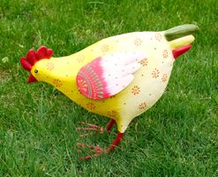 Huhn aus Metall gelb
