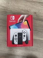Nintendo Switch OLED + 8 jeux dont Ring Fit + accessoires