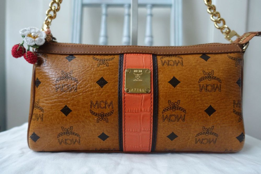 Mcm pochette hot sale