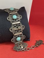 Armband mit Turmalin-Imitat und Elefantenmotiv