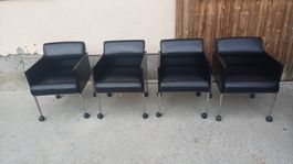 4 Sessel Rosenthal Einrichtung schwarz mit Rollen 47