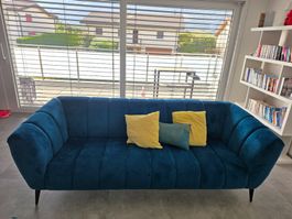 Canapé bleu océan et son pouf