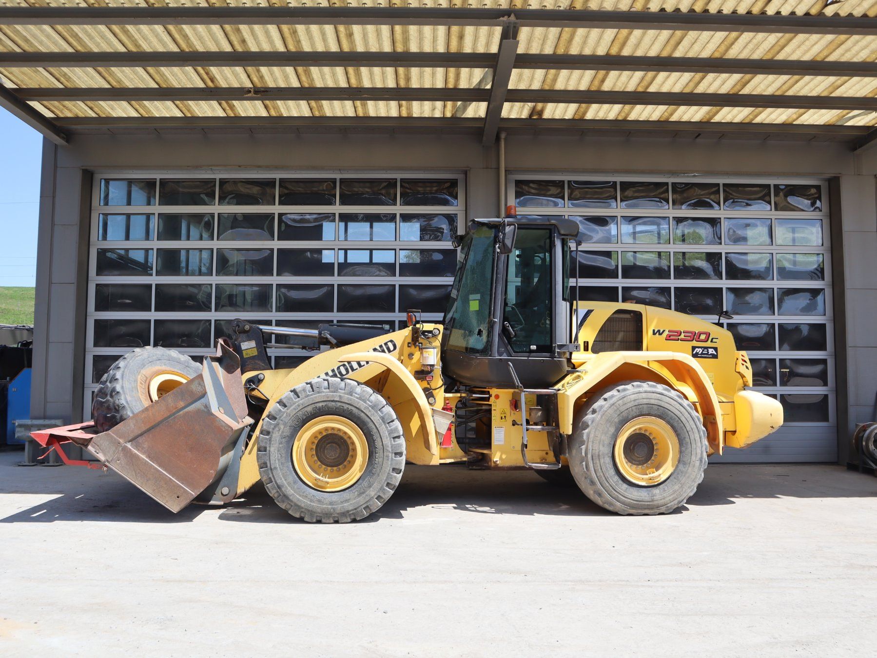 New Holland Tutte le macchine: New Holland W230C Radlader – Usato da Hasle LU venduto da Arag08
