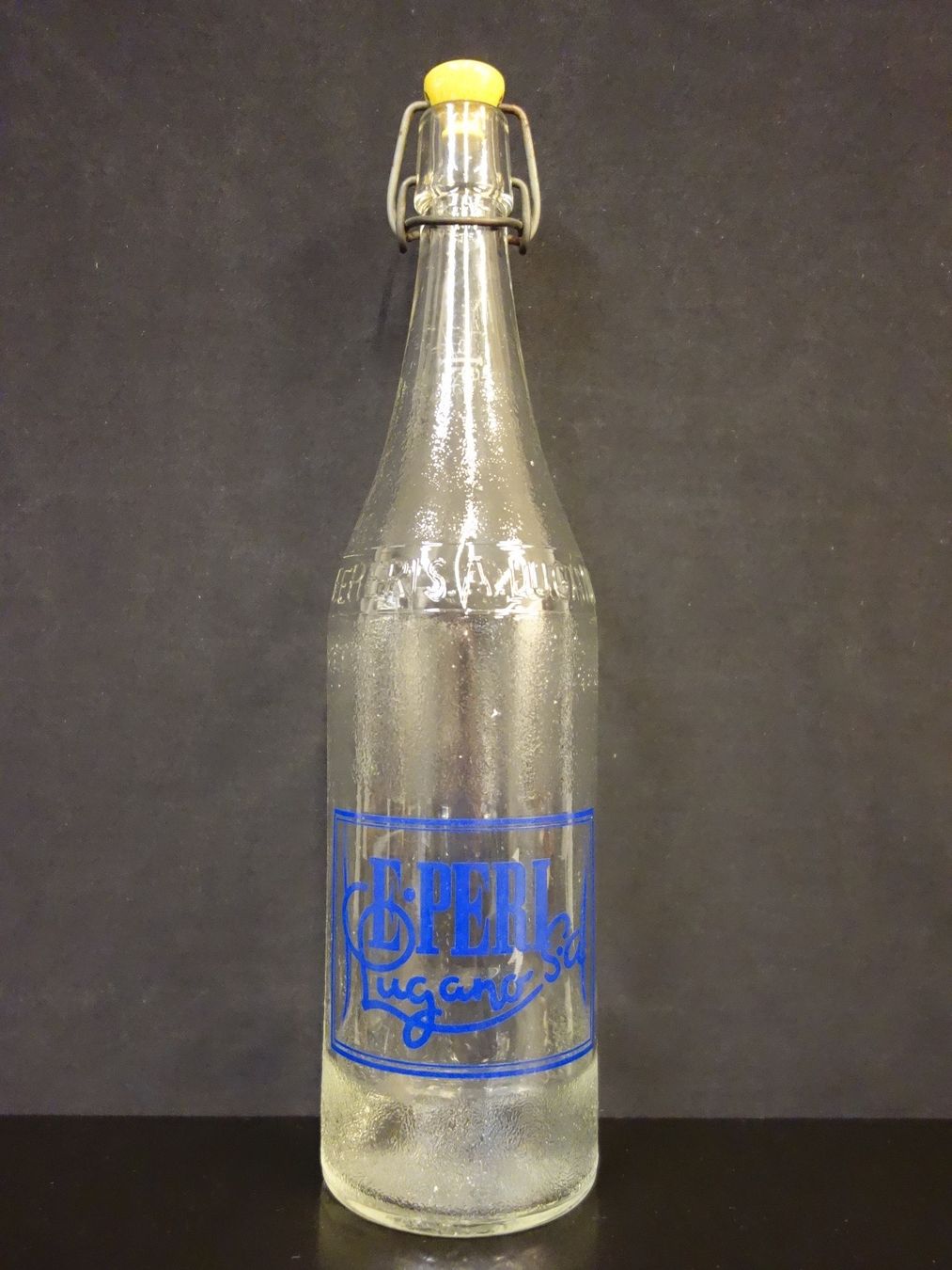 Bicchieri, Caraffe & Bottiglie: alte Flasche EMILIO E. PERI LUGANO 1962 ARANCIATA – Usato da Kerzers venduto da Flaschenposten 1