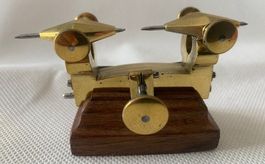 Outil horloger - compas aux engrenages ancien