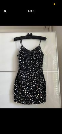 Black Sequin Mini Dress. Perfect for party season!