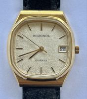Montre Mirexal Quartz plaque d’or  Date Doré Bon état