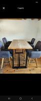 Table haute bois avec quatre chaises état correct 