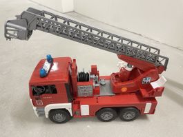 Feuerwehr Leiterwagen MAN gut erhaltenes Spielzeug