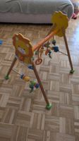 Süsser Spielbogen mit Löwenmotiv, normale Gebrauchsspuren