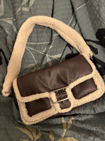 borsa pelosa in simil pelle