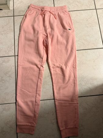 Pantalon de jogging Lacoste rose pâle, taille 34 comme neuf!