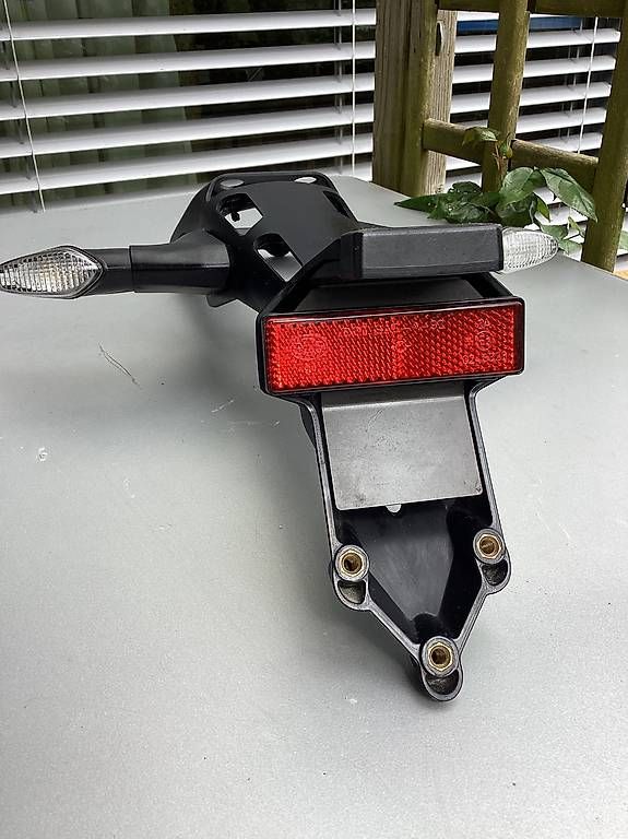 Ducati Alle Motorradersatzteile: Original Ducati Monster 1200R  Nummernschildhalter/ Blinker – Gebraucht aus Endingen von oliver8