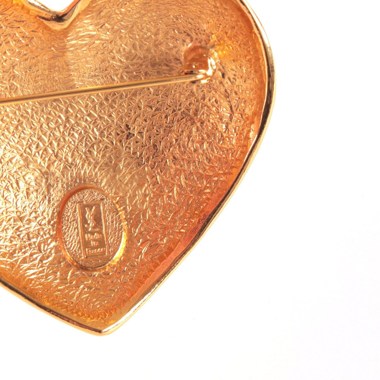 Saint Laurent Spille & Fermagli: Broche en coeur métal doré YSL – Usato da Delémont venduto da Le38.shop 1