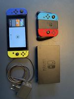 Nintendo Switch + Zubehör 2 Controller