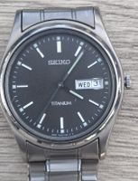 Seiko Titanium D/D Quartz watch with a grey dìal.Nov 2008.
