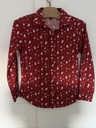 Chemise enfant motifs Noel rouge comme neuve taille 146/152