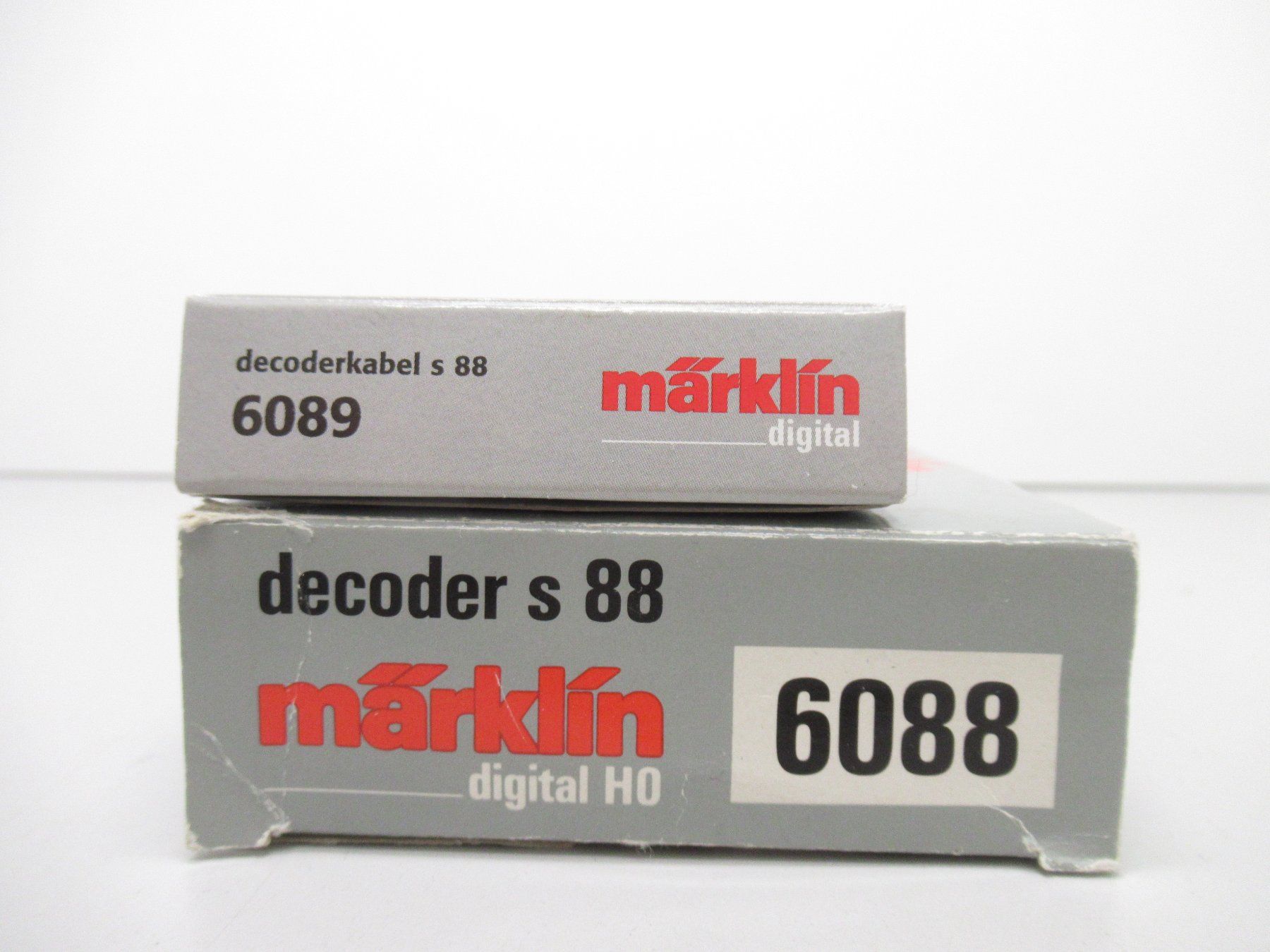 Märklin Modelleisenbahnen: Märklin 6088+6089 Decoder s88 + Decoderkabel – Gebraucht aus Basel von  1