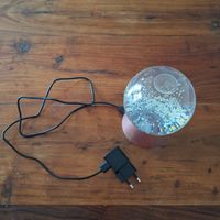 Glas-Kugel Lampe die leuchten kann.