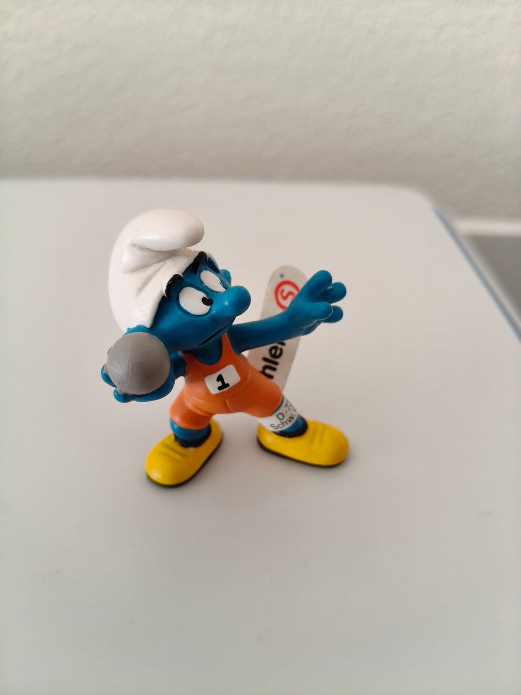 Schleich Statuette: Schlumpf Kugelstosser – Nuovo e nell'imballaggio originale da Rothrist venduto da Stranglehold