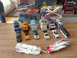 Diverse Team Transporter 1:64 Maisto Modellautos