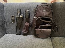 Nikon D7000 + AF-S DX 16-85mm VR, mit Rucksack
