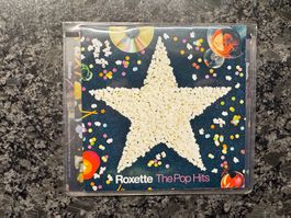 CD „Roxette - The Pop Hits“ in Softcover-Hülle
