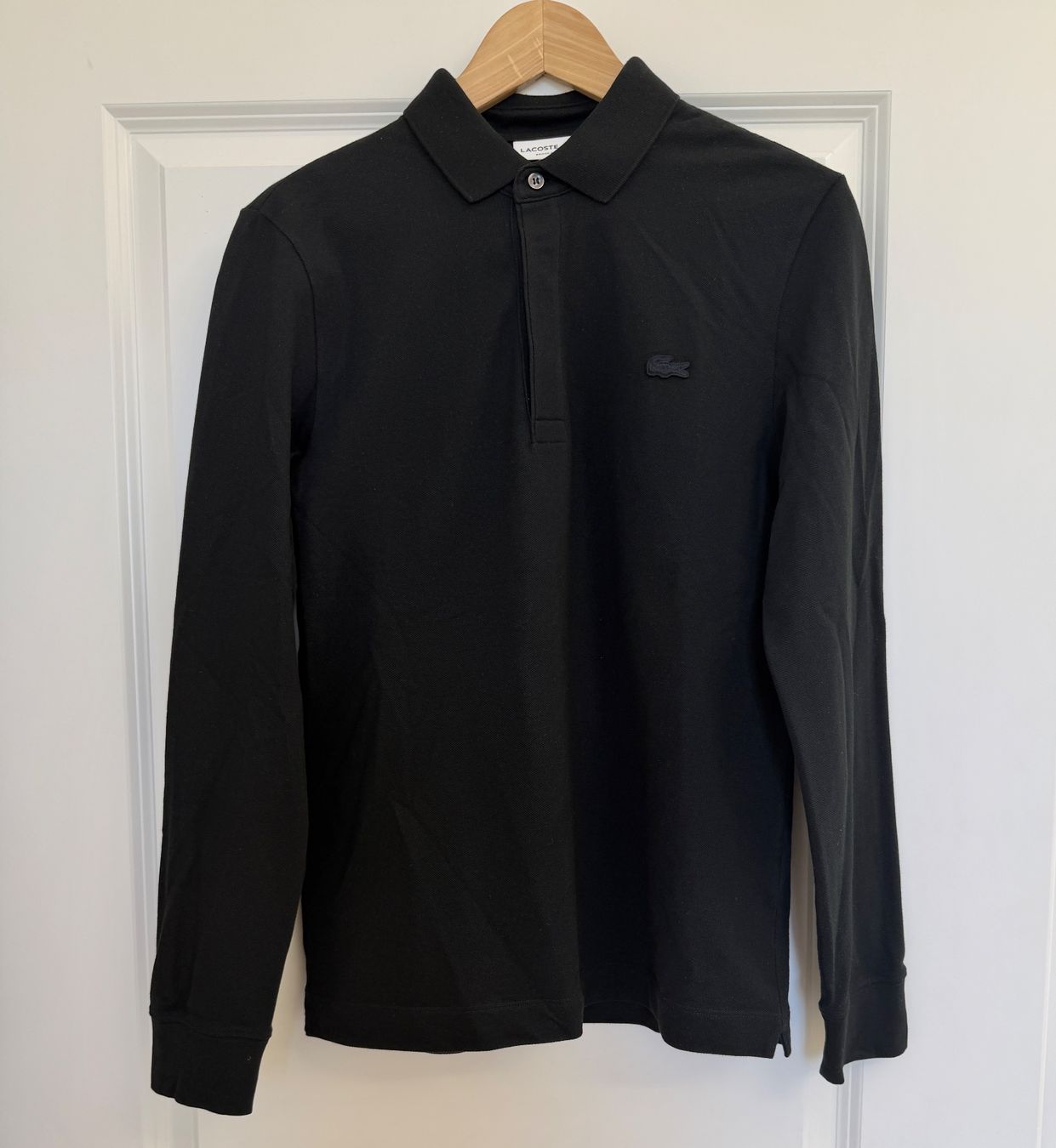 Lacoste Polo-Shirts: Polo manches longues noir Lacoste – Gebraucht aus giffers von sev_c9x9