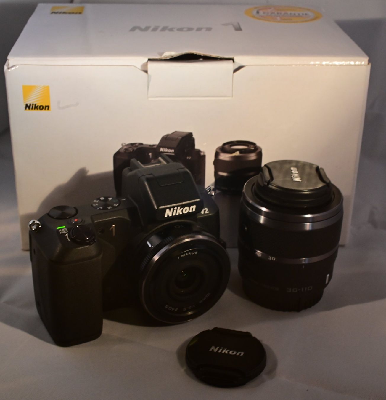 Nikon Fotocamera: Nikon 1 V2 mit zwei Objektiven – Usato da Uster venduto da Stoessda 2