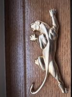 Vintage gold tone panther brooch 1986 signed JJ