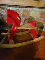 Rotes Schaukelpferd aus Holz, guter Zustand
