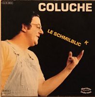 COLUCHE - LE SCHMILBLICK