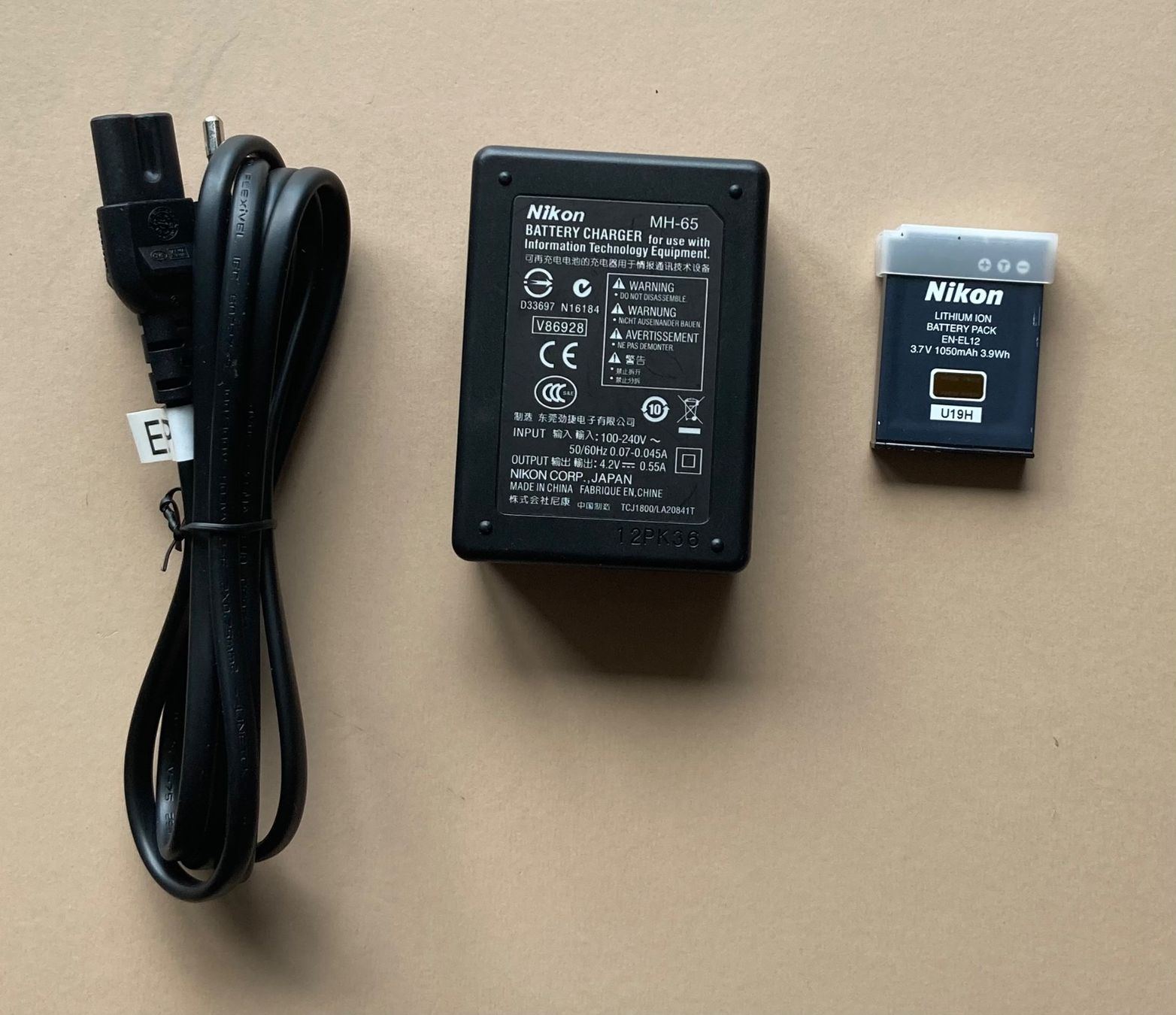 Nikon Altri Accessori: Nikon Battery Charger MH-65 – Usato da Ebmatingen venduto da salt02 1