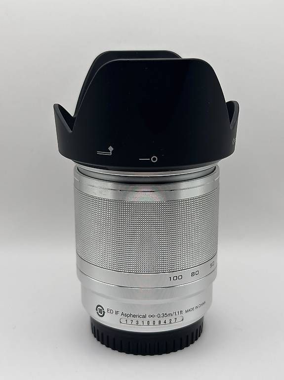 Nikon Obiettivi: Nikon 1 NIKKOR 10-100mm VR Silber – Usato da Merenschwand venduto da Sbj 1